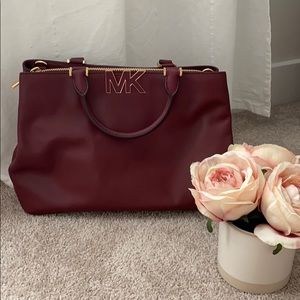 Crossbody burgundy Michael Kors handbag leather